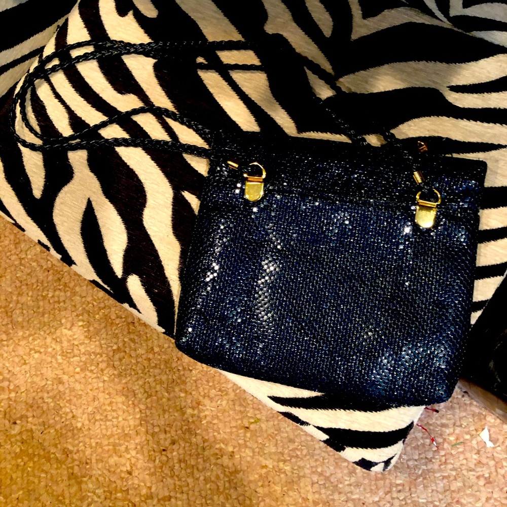 Black handbag with over the shoulder straps